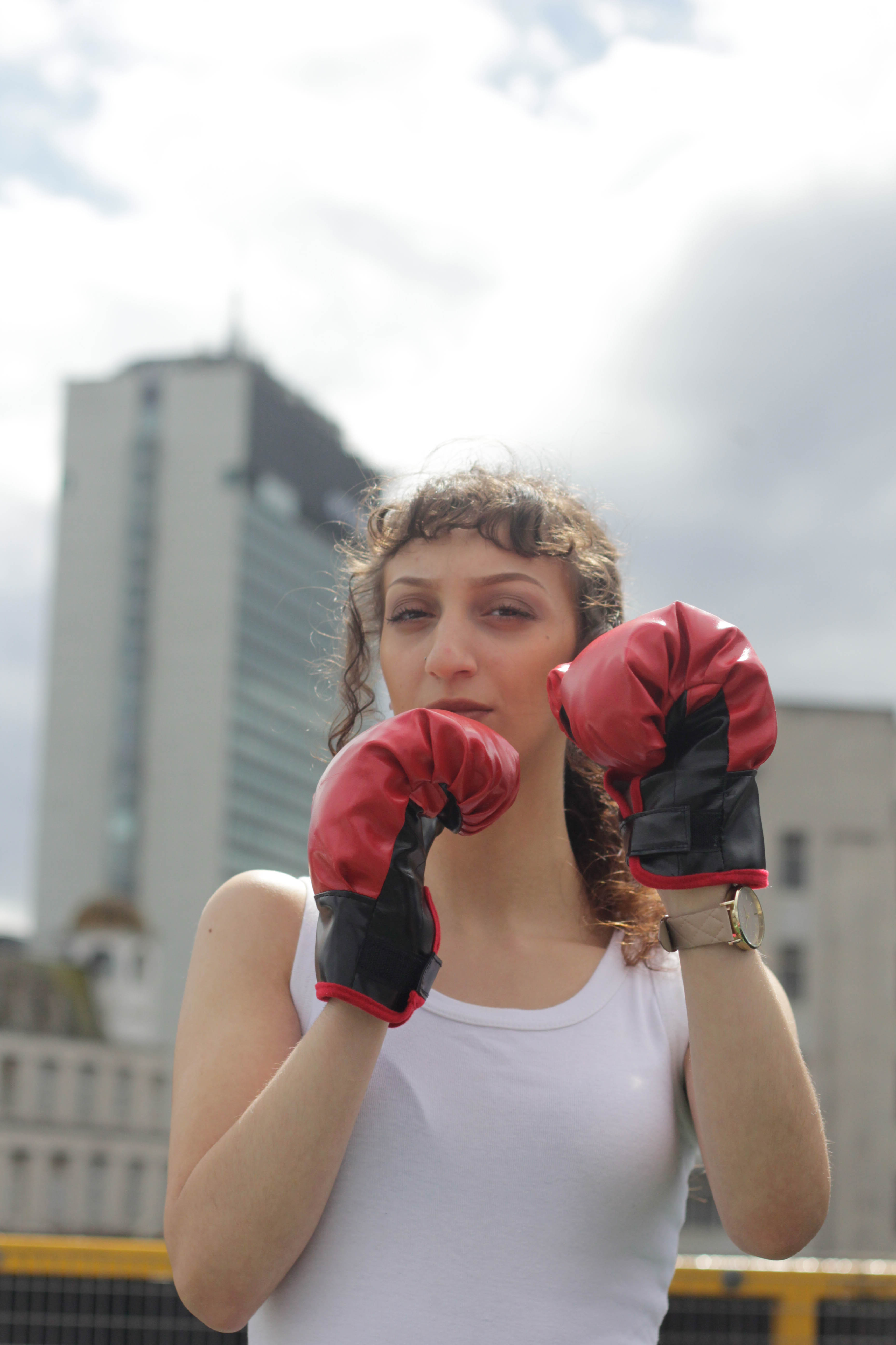 Shot of face with boxing gloves.